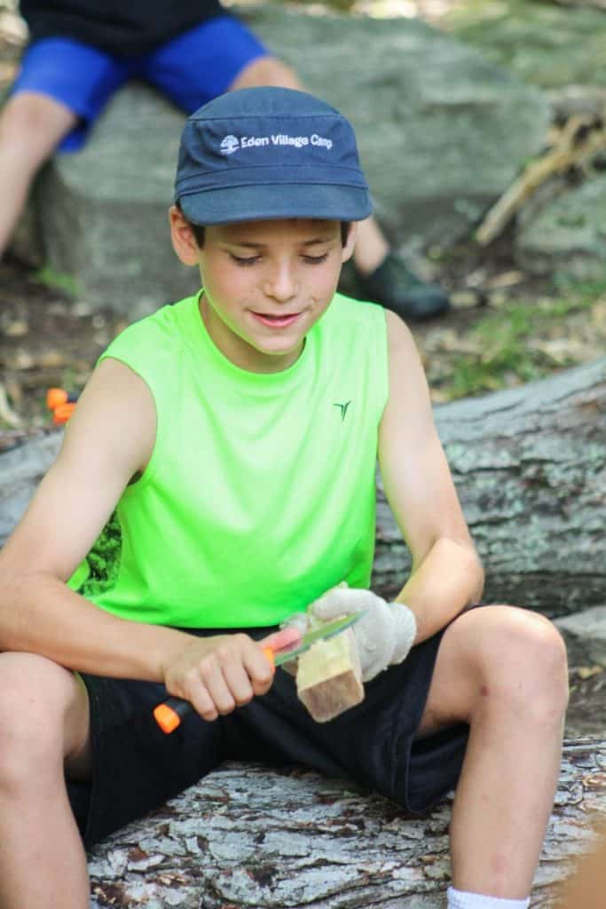 Kids enjoying outdoor activities at Eden Village Camp, eco-friendly summer camp focused on sustainability and nature exploration.